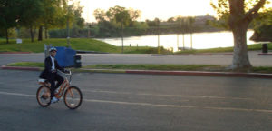 person riding on road